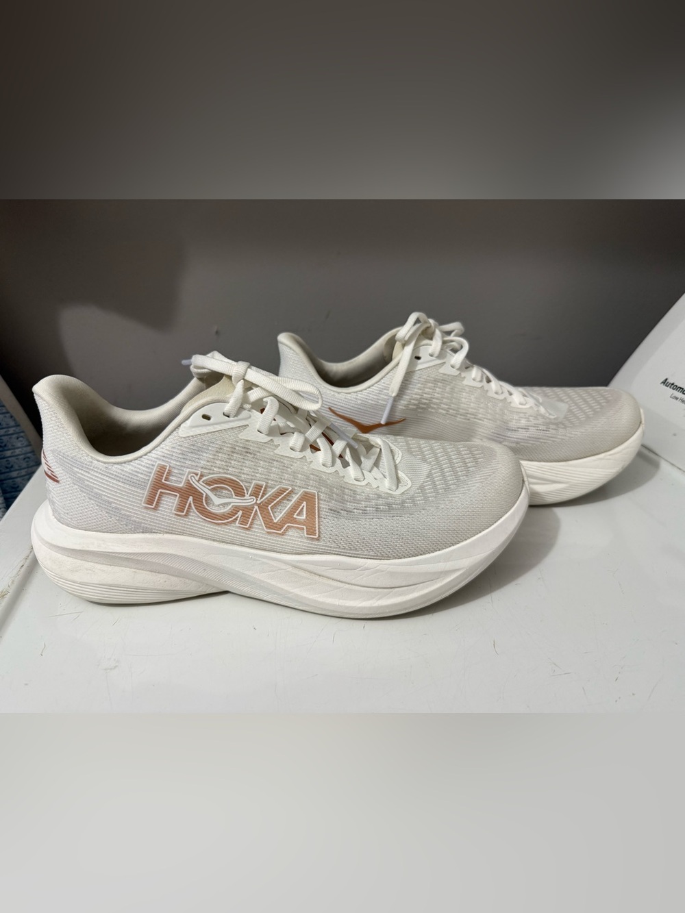 Hoka Women’s White Athletic Shoes with Rose Accents *basically brand new*